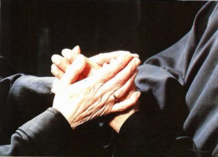 Newly professed sister greeted by the Abbess