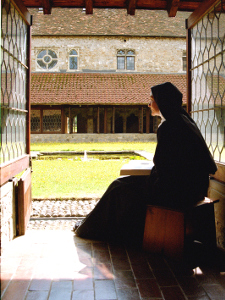Nun reading in the Cloister
